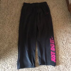 Dark gray and pink Nike sweatpants
